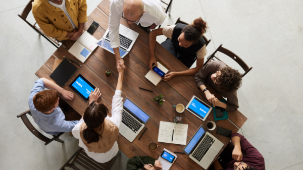 Group of people on laptops