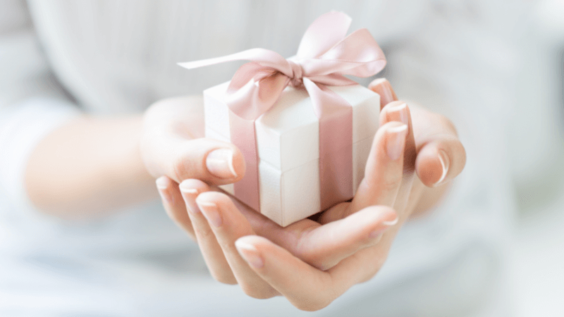 Hands holding gift