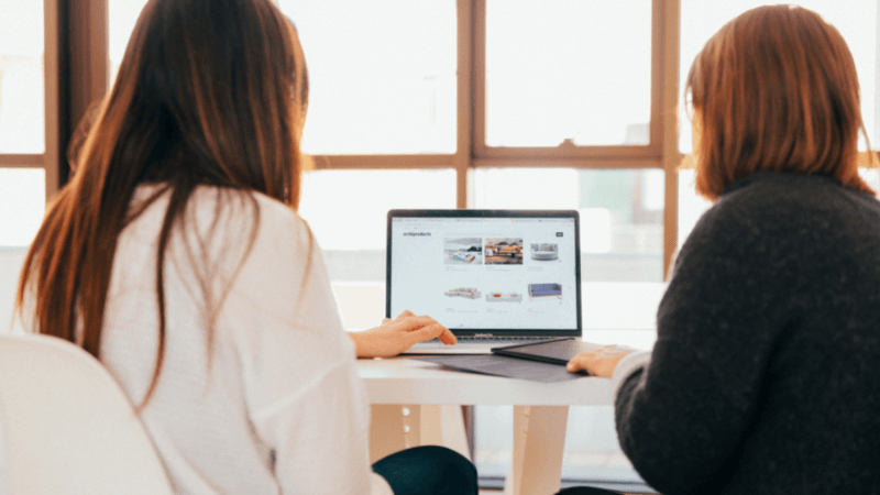 Women looking at laptop