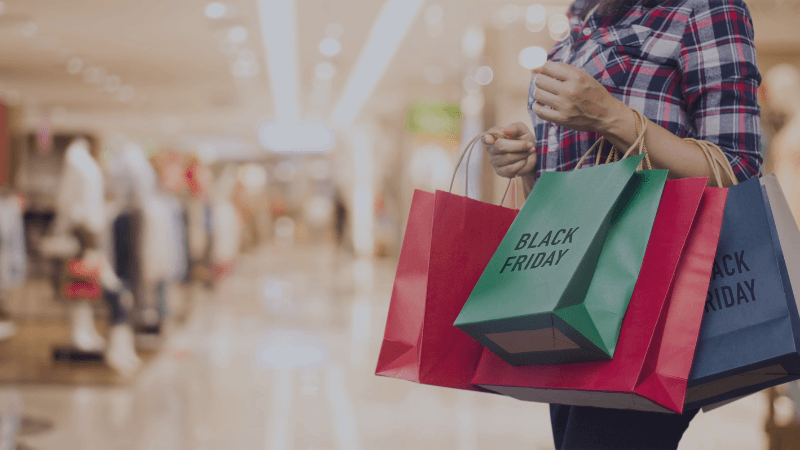 Woman carrying shopping bags